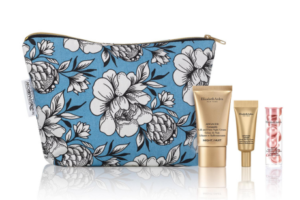 Gift-with-purchase bags from Elizabeth Arden, produced through its collaboration with Sparrow Society, featuring floral print and luxury skincare bottles.